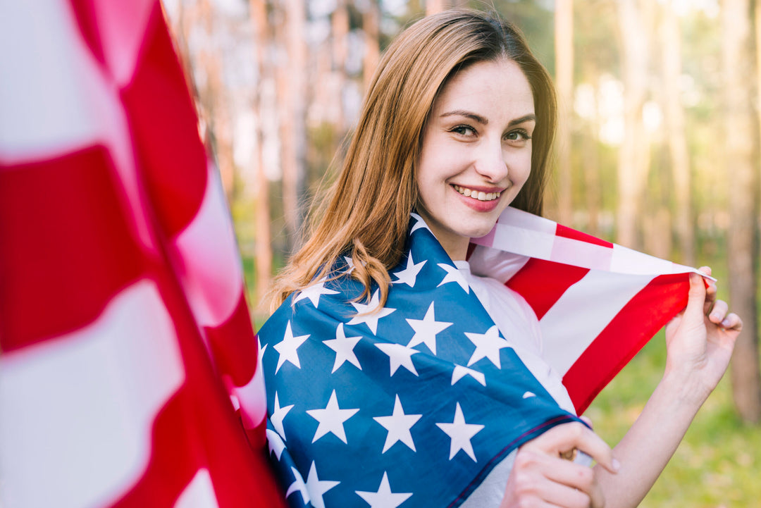 smiling-woman-wrapped-national-american-flag-lash-extension